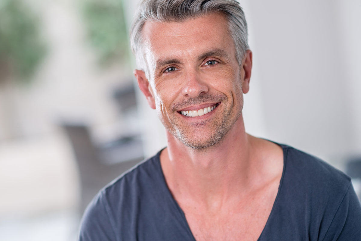 A handsome man using wrinkle relaxers in Charlotte